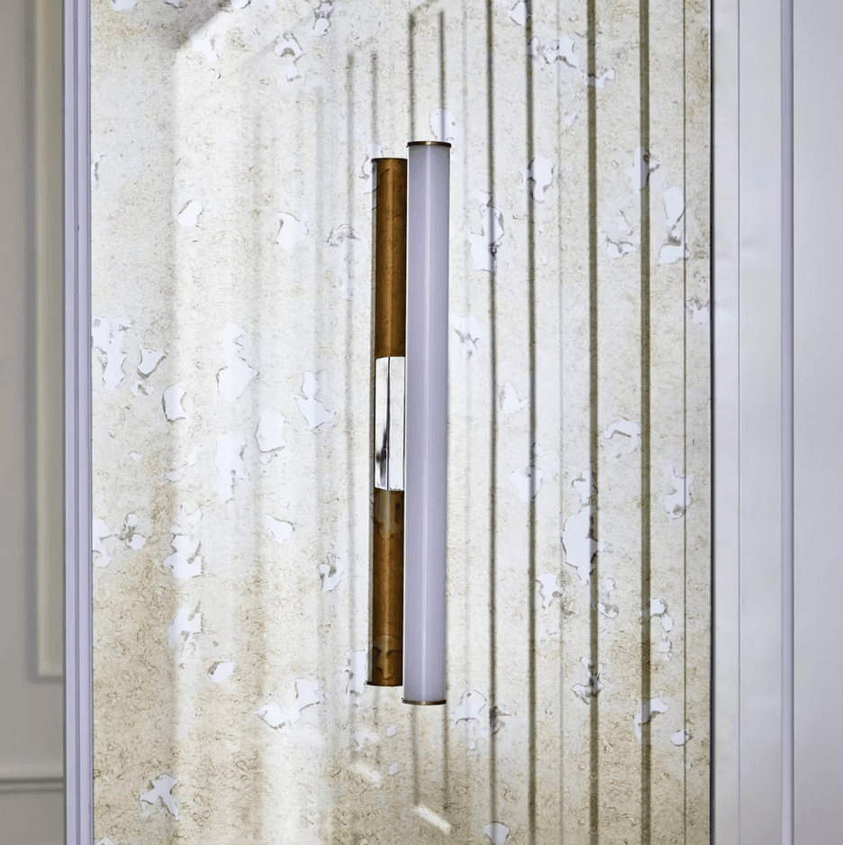 Brass lighting detail in the Retiro residence